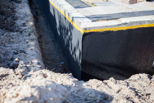 Professional Waterproofing technician working in Strykersville, NY